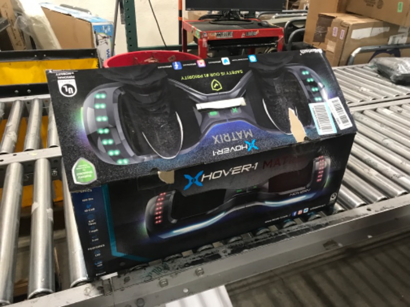 Photo 1 of Hover-1 Matrix Electric Self-Balancing Hoverboard with 6.5” LED Tires, Color-Changing Fender Lights, Dual 150W Motors, 7 mph Max Speed, and 3 Miles Max Range Gun Metal