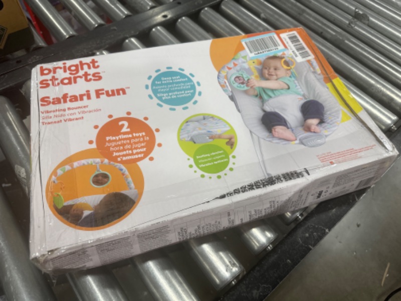Photo 1 of Bright Starts Safari Fun 3-Point Harness Vibrating Baby Bouncer with Toy bar