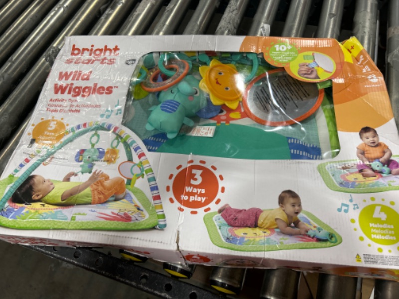 Photo 2 of Bright Starts Wild Wiggles Activity Gym & Play Mat with Take-Along Toys, Ages Newborn +