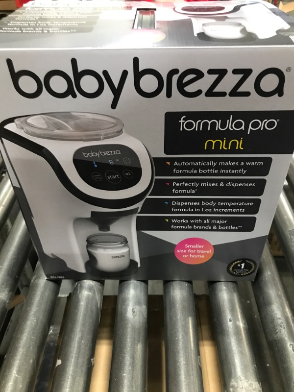 Photo 4 of Baby Brezza Formula Pro Mini Baby Formula Maker – Small Baby Formula Mixer Machine Fits Small Spaces and is Portable for Travel– Bottle Makers Makes The Perfect Bottle for Your Infant On The Go Formula Pro Mini Dispenser Machine