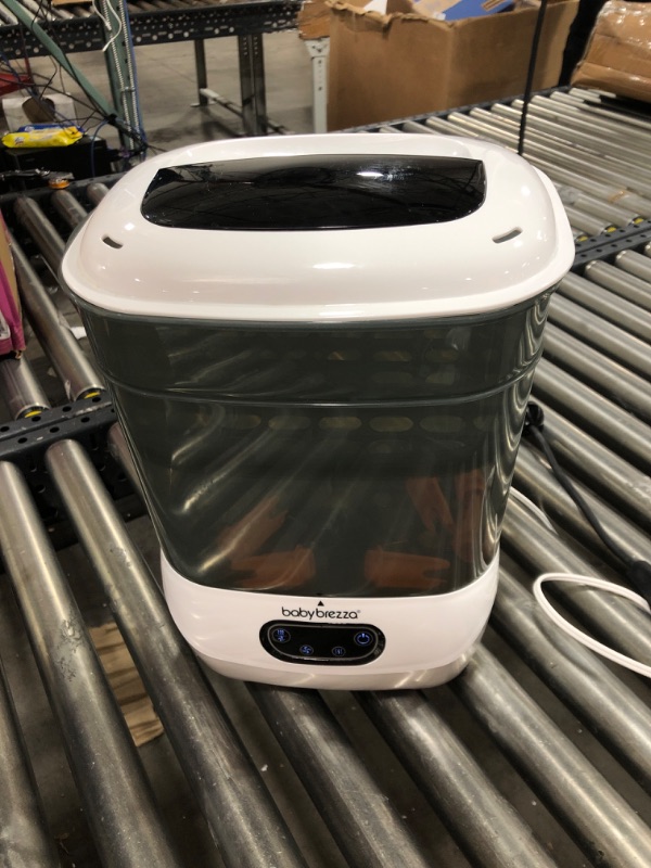 Photo 1 of Baby Brezza Baby Bottle Sterilizer and Dryer Advanced – Electric Steam Sterilization Machine – Universal Sterilizing for All Bottles: Plastic + Glass + Pacifiers + Breast Pump Parts - HEPA Filtration