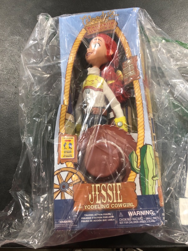 Photo 2 of Disney Store Official Jessie Interactive Talking Action Figure from Toy Story, 15 Inches, Features 10+ English Phrases & Sounds, Interacts with Other Figures and Toys, Removable Hat, Ages 3+