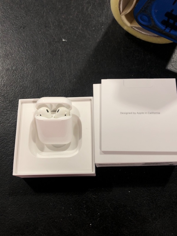 Photo 2 of Apple AirPods with Charging Case (Latest Model)