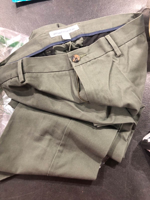 Photo 2 of Amazon Essentials Men's Classic-Fit Wrinkle-Resistant Flat-Front Chino Pant 33W x 32L Olive