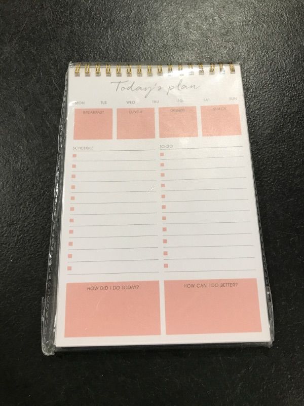 Photo 1 of Daily To Do List- Non-Dated Daily Planner Schedules Appointment Meal Planner, Flexible cover, Strong Top Spiral Binding, To Increase Productivity. 5.5" x 8.5". Vibrant oranges