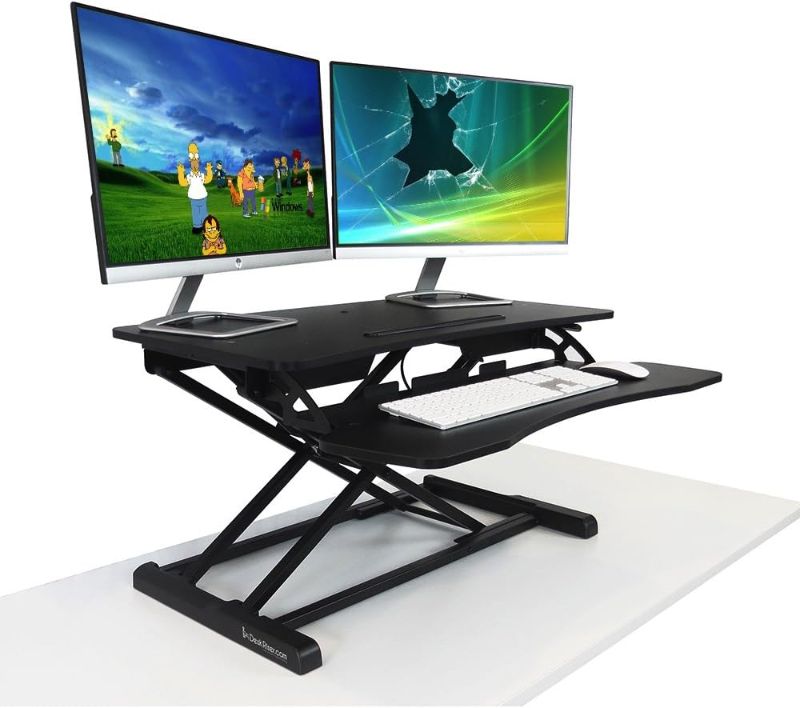 Photo 1 of Standing Desk - The 32X DeskRiser - Height Adjustable Sit Stand Desk - Heavy Duty Supports up to 35 Lbs - 32 inch Wide Sit Stand Up Desk Converter
