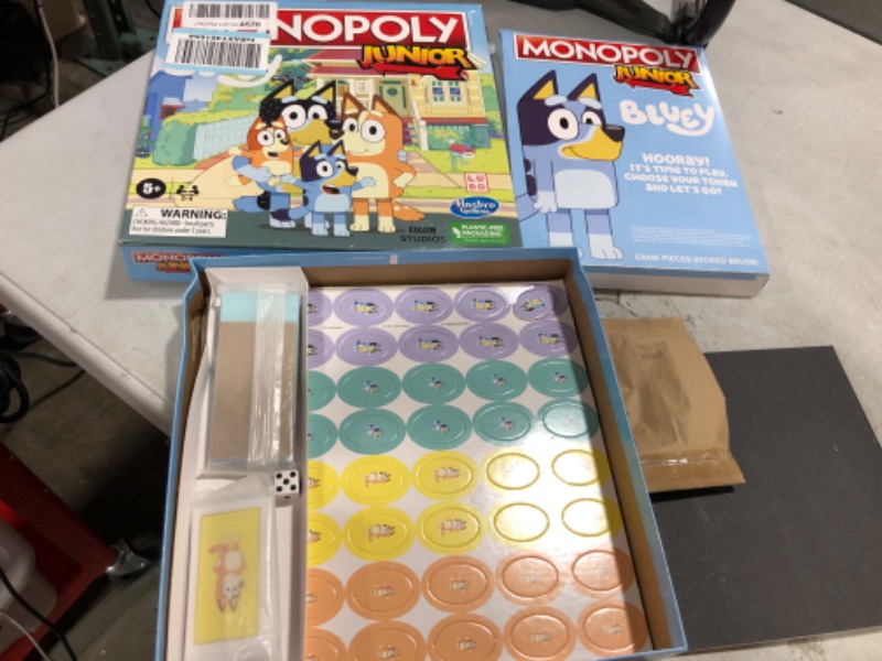 Photo 2 of Monopoly Junior: Bluey Edition Board Game for Kids Ages 5+, Play as Bluey, Bingo, Mum, and Dad, Features Artwork from The Animated Series (Amazon Exclusive)