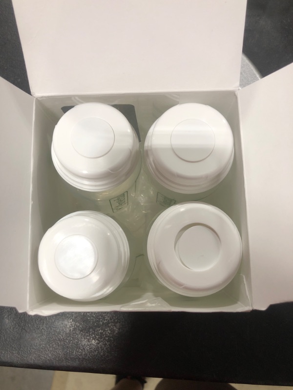 Photo 2 of Ameda Breast Milk Storage Bottles Includes: (4) 4oz. Bottles with (4) 2-Piece Lock-Tight Caps