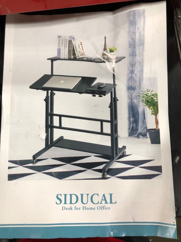 Photo 1 of SIDUCAL Mobile Stand Up Desk, Adjustable Standing Desk with Lockable Wheels Storage Computer Desk Home Office Workstation, Portable Rolling Desk Laptop Cart for Standing or Sitting, Black
