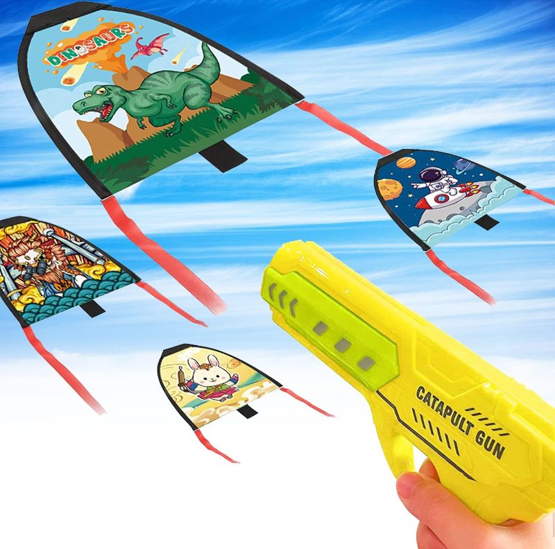 Photo 1 of 2023 New Children's Kite Launcher, Fun Beach Kite Toy Set, Outdoor Children's Handheld Ejection Aircraft Kite Toy- Yellow