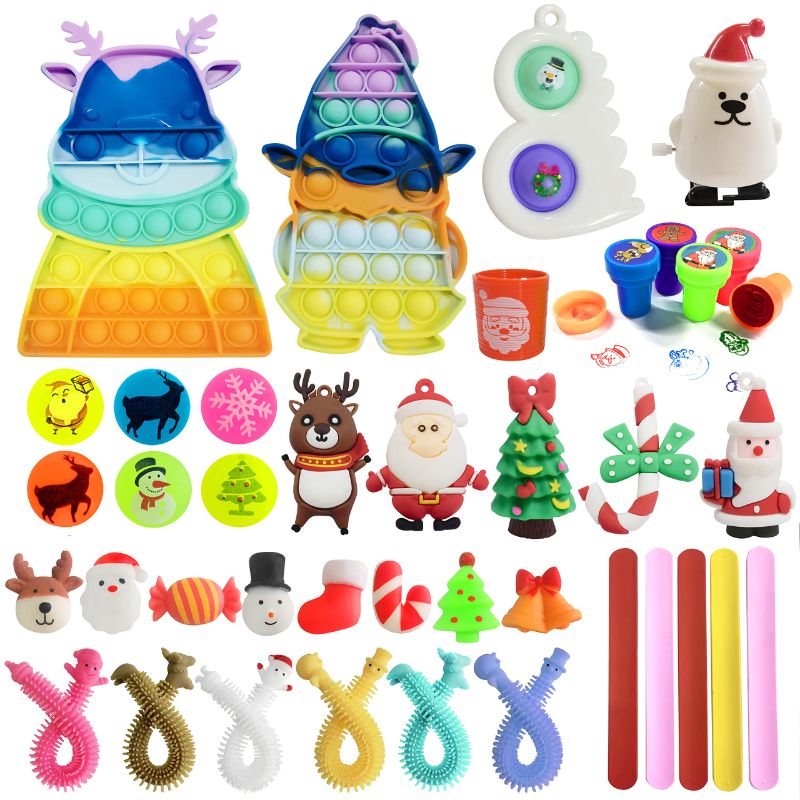 Photo 1 of Christmas Novelty Assortment Pop Dimple Toys,Colorful Decorations Game Toys Packs for Kids Party Favors, Christmas Goodie Bags (Christmas-40)