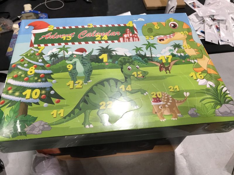 Photo 1 of Advent Calendar 2022 Christmas Gifts - 24 Days Countdown to Christmas Advent Calendar for Kids with Dinosaur Toy Figures, Christmas Gifts for Boys Girls 3-10, Christmas Party Favors/New Year Gifts