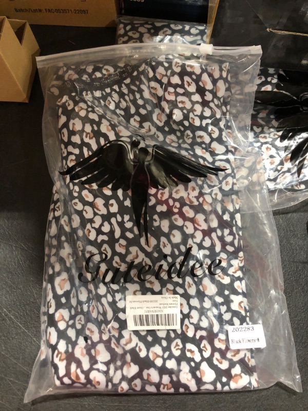 Photo 1 of BLACK FLORAL SHIRT MEDIUM 