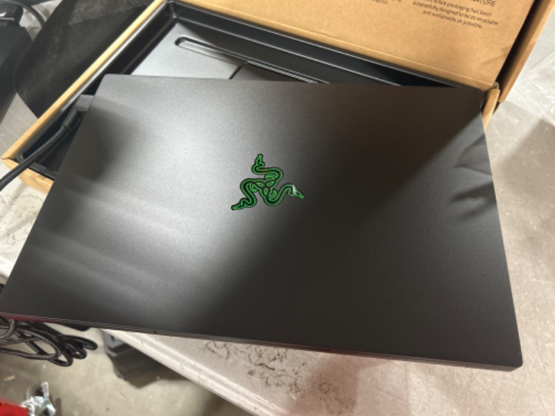 Photo 4 of Razer Blade 14 Gaming Laptop: AMD Ryzen 9 6900HX CPU - NVIDIA GeForce RTX 3070 Ti - 14" QHD 165Hz - 16GB DDR5 RAM - 1TB PCIe SSD - Windows 11 - Ultra-Thin - CNC Aluminum - Chroma RGB Ryzen 9 6900HX RTX 3070 Ti Classic Black