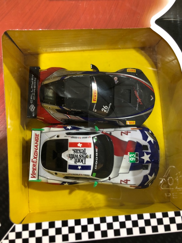 Photo 1 of Carrera GO!!! 62521 onto The Podium Electric Powered Slot Car Racing Kids Toy Race Track Set Includes 2 Hand Controllers and 2 Cars in 1:43 Scale