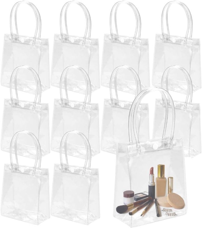 Photo 1 of CZWESTC 16 Pcs Clear PVC Gift Bags with Handles, Small Transparent Gift Wrap Bags, Clear Tote Bag, Reusable Shopping Bags with Handle for Merchandise, Retail, Small Business (5.9 x 5.1 Inch)
