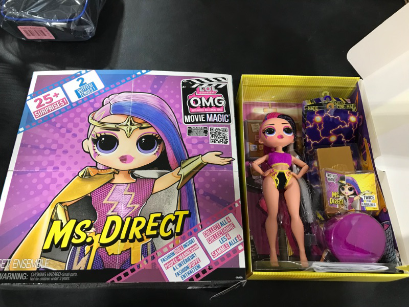 Photo 2 of L.O.L. Surprise! OMG Movie Magic Ms. Direct Fashion Doll with 25 Surprises Including 2 Outfits, 3D Glasses, Movie Accessories,Toys for Girls Boys Ages 4 5 6 7+ Years Old,Multicolor 1 Count (Pack of 1)