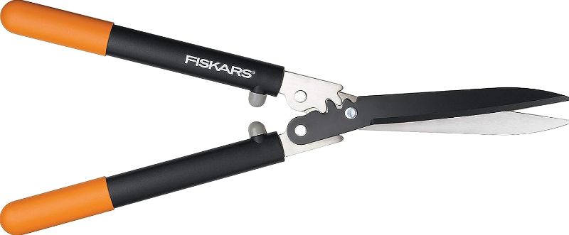 Photo 1 of  Fiskars PowerGear2 Hedge Shears - 23" Precision-Ground Low-Friction Coated Steel Blade -  Gardening Tool with Shock-Absorbing Bumpers 