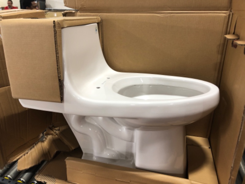 Photo 2 of 1-piece 1.1 GPF/1.6 GPF High Efficiency Dual Flush Elongated Toilet in White Slow-Close, Seat Included
