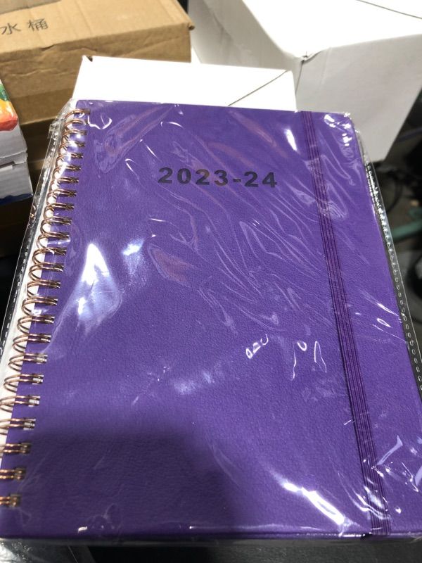 Photo 1 of 5.5" x 8.25" purple 23-24 weekly and monthly planner