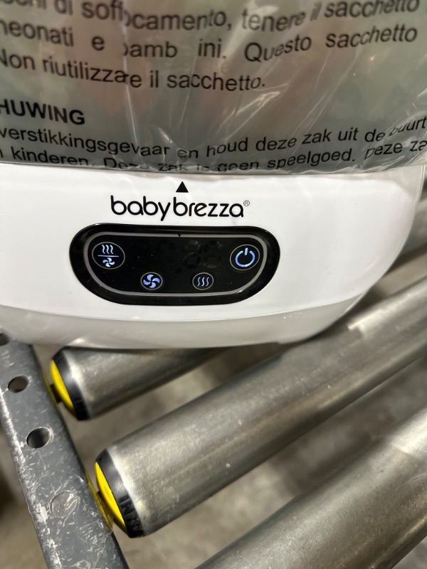 Photo 2 of Baby Brezza Bottle Sterilizer and Dryer Advanced – HEPA Filter And Steam Sterilization – Dries 33 Percent Faster Then Original - Universal Fit up to 8 Baby Bottles And 2 Sets of Pump Parts (Any Brand) Sterilizer-Dryer Advanced