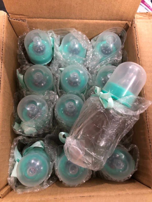 Photo 1 of 12 Pcs 5.5 Inch Baby Shower Clear Bottles Favor Green Candy Baby Bottles Mini Glass Baby Bottles for Baby Shower Favors Party Gift Decoration