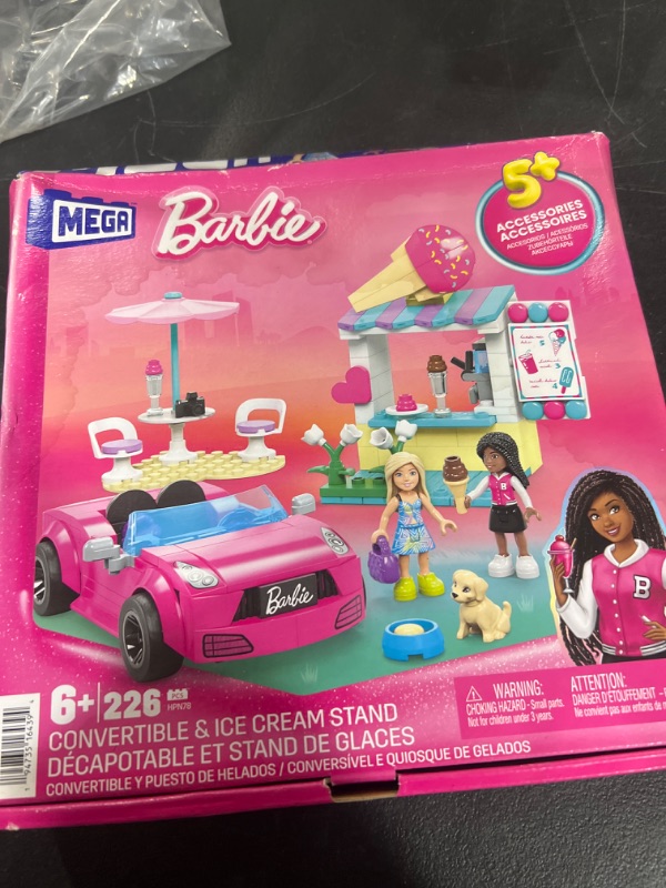 Photo 1 of Barbie MEGA Car Building Toys Playset, Convertible & Ice Cream Stand With 225 Pieces, 2 Micro-Dolls and Accessories, Pink,
