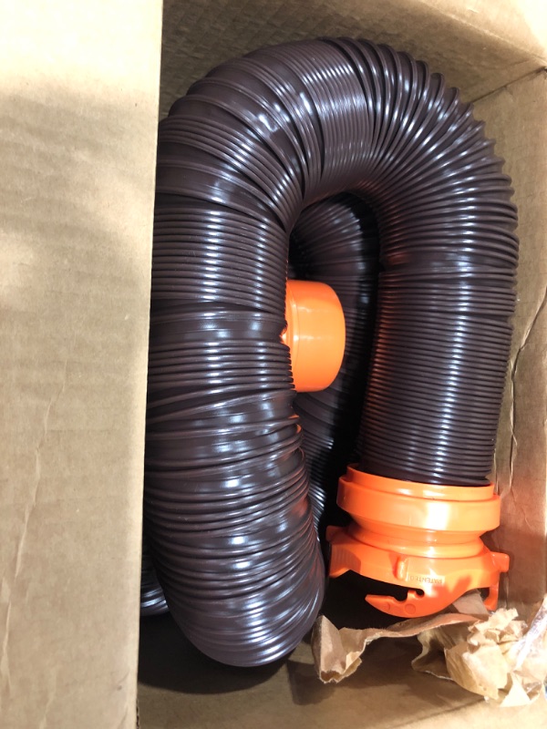 Photo 2 of Camco RhinoFLEX RV Sewer Hose Kit with Swivel Transparent Elbow and 4-in-1 Dump Station Fitting, Brown, 15 Feet (39770) 15ft Sewer Hose Kit Frustration-Free Packaging