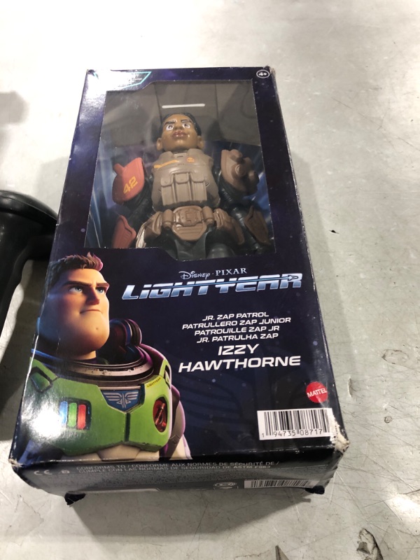 Photo 1 of Disney Pixar Lightyear Large Scale 12 Inch Scale Jr ZAP Patrol Izzy Hawthorne Action Figure, 14 Movable Joints, Movie Collectible Toy 4 Years & Up Jr. ZAP Patrol Izzy Hawthorne