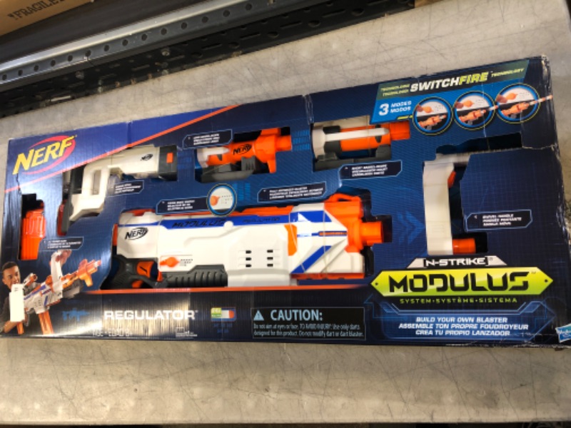 Photo 2 of Nerf Modulus Regulator Fully Motorized Blaster, 3 Firing Modes, 2X 12-Dart Clips, 24 Nerf Elite Darts, Nerf Full Auto Blaster, Kids Outdoor Toys (Amazon Exclusive) Standard Packaging ONLY PACKAGING HAS MINIMAL DAMAGE 