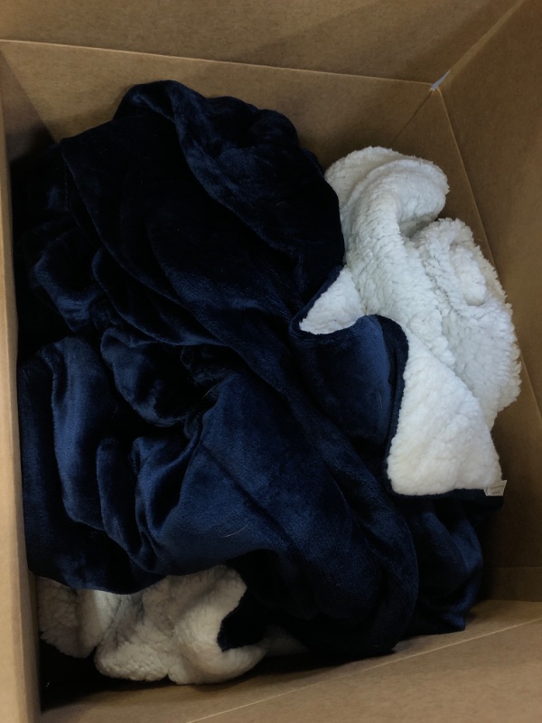 Photo 2 of Bedsure Sherpa Fleece Throw Blanket for Couch - Thick and Warm Blankets for Winter, Soft and Fuzzy Throw Blanket for Sofa, Navy, NEEDS CLEANING

