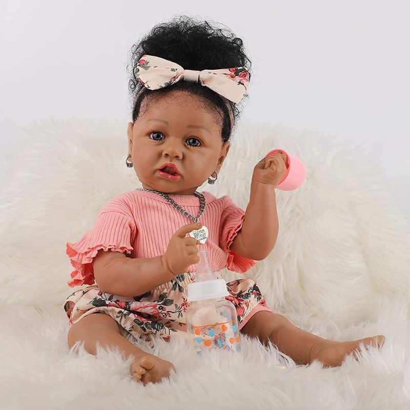 Photo 1 of HOOMAI Lifelike Reborn Baby Dolls with Soft Body African American Realistic Girl Doll 22.8 Inch Best Birthday Gift Set
