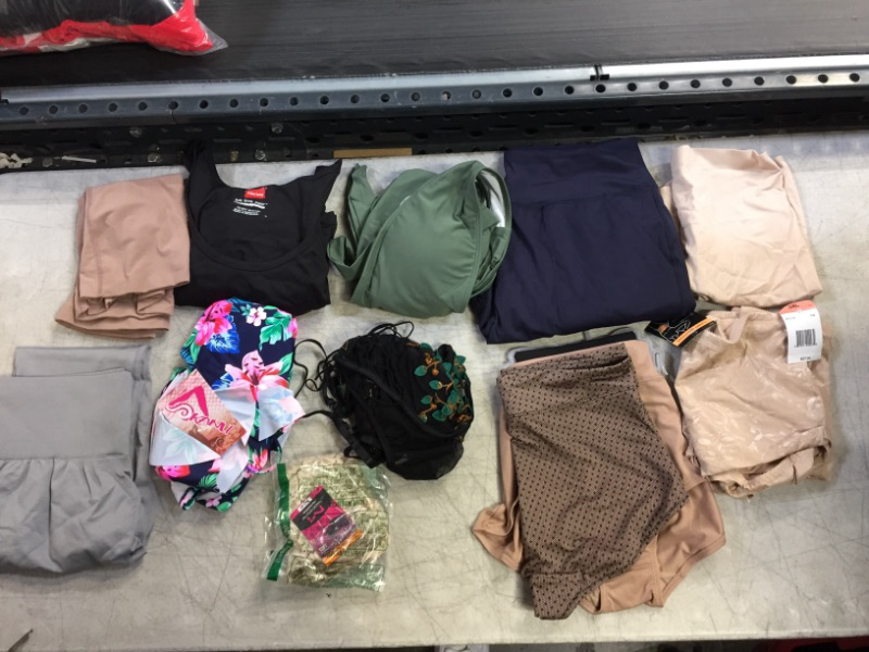 Photo 2 of BAG LOT... MISC CLOTHING. VARIOUS STYLES AND SIZES. NEW AND USED SOLD AS IS.