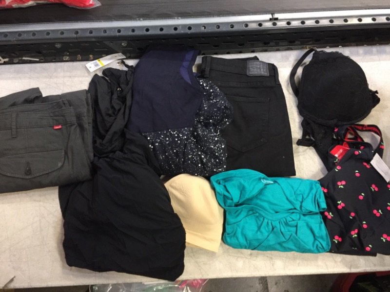 Photo 1 of BAG LOT... MISC CLOTHING. VARIOUS STYLES AND SIZES. NEW AND USED SOLD AS IS.