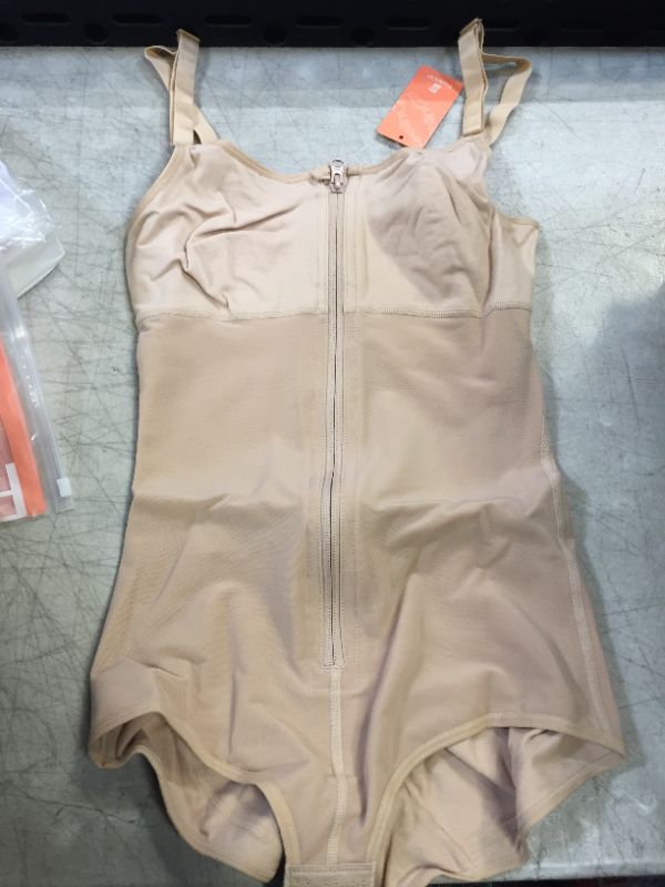 Photo 1 of BEIGE BODY SUIT
SMALL