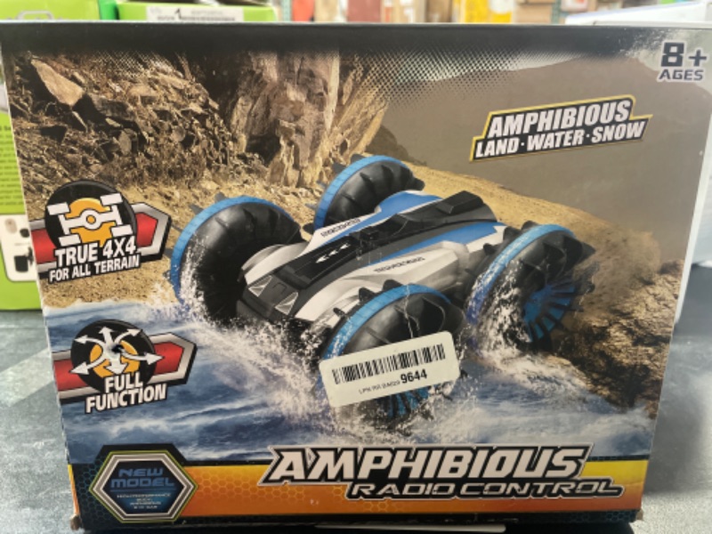 Photo 5 of Amphibious RC Car Remote Control Car Boat Truck 4WD 2.4Ghz Land Water 2 in 1 Easter Basket Stuffers for Kids Multifunction Waterproof Stunt 1: 16 Remote Vehicle with Rotate 360 All Terrain Toy Gift
