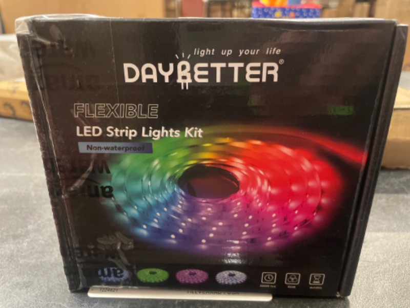 Photo 2 of DAYBETTER Led Strip Lights 32.8ft Kit with Remote and Power Supply Color Changing
