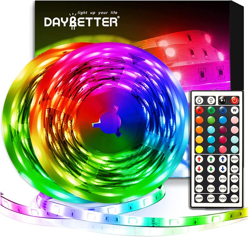 Photo 1 of DAYBETTER Led Strip Lights 32.8ft Kit with Remote and Power Supply Color Changing
