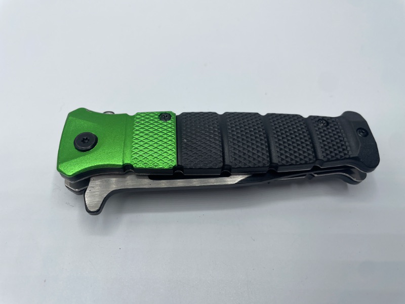 Photo 1 of GREEN AND BLACK POCKET KNIFE W CLIP NEW 
