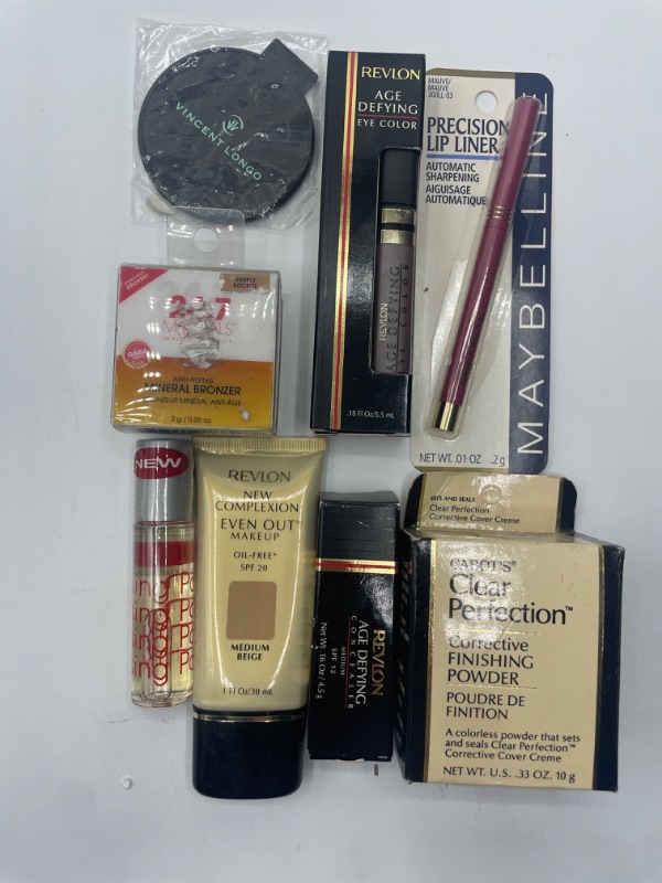 Photo 1 of Miscellaneous variety brand name cosmetics including (Vincent logo, Maybelline , Revlon & discontinued makeup products)