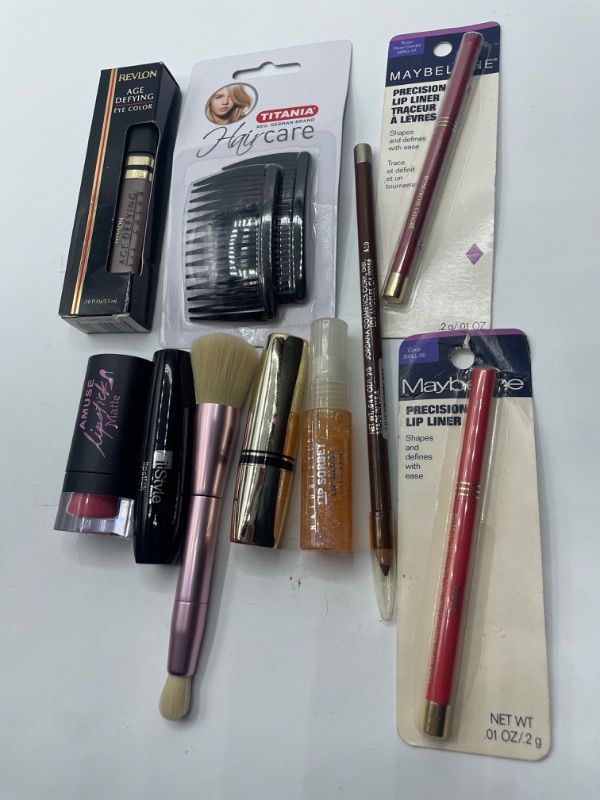 Photo 2 of Miscellaneous variety brand name cosmetics including (Maybelline, Revlon, It style, titania, & discontinued makeup products)