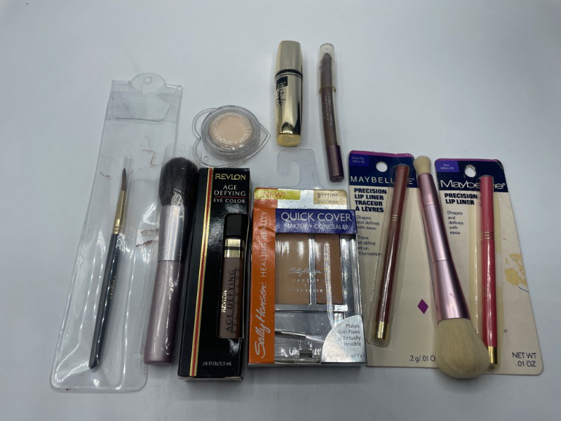 Photo 1 of Miscellaneous variety makeup brand Name cosmetics including ( Maybelline , Revlon ,It Style, Sally Hansen & DISCONTINUED MAKEUP ITEMS)