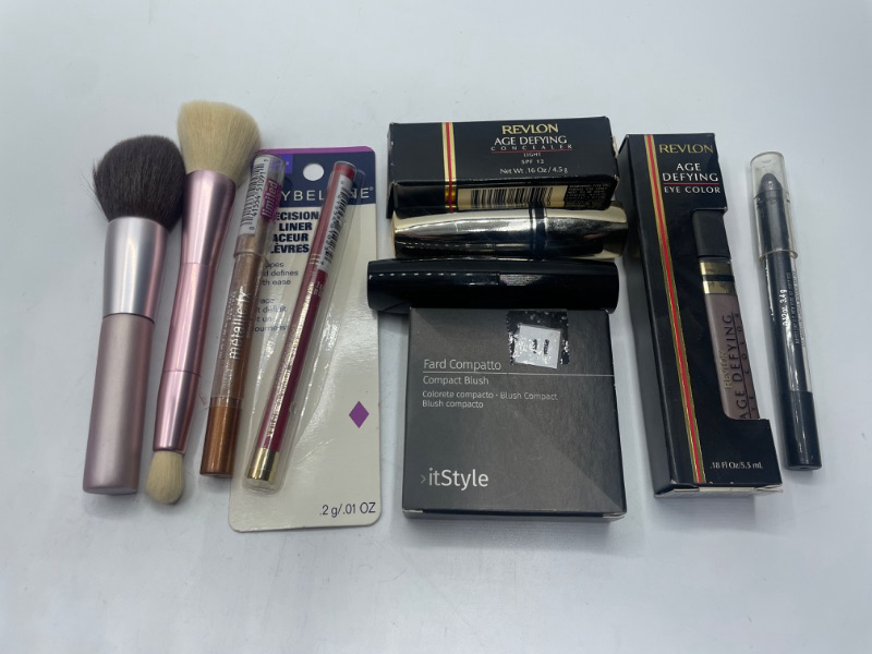 Photo 1 of Miscellaneous variety makeup brand Name cosmetics including (  Revlon ,It Style, Sally Hansen & DISCONTINUED MAKEUP ITEMS)