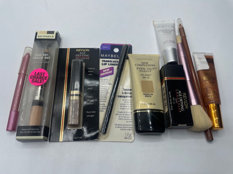 Photo 1 of Miscellaneous variety makeup brand Name cosmetics including ( Maybelline , Revlon ,ultima 
2  & DISCONTINUED MAKEUP ITEMS)