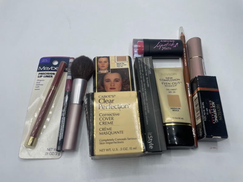 Photo 1 of Miscellaneous variety makeup brand Name cosmetics including ( Maybelline , Revlon ,It Style, Amuse & DISCONTINUED MAKEUP ITEMS)