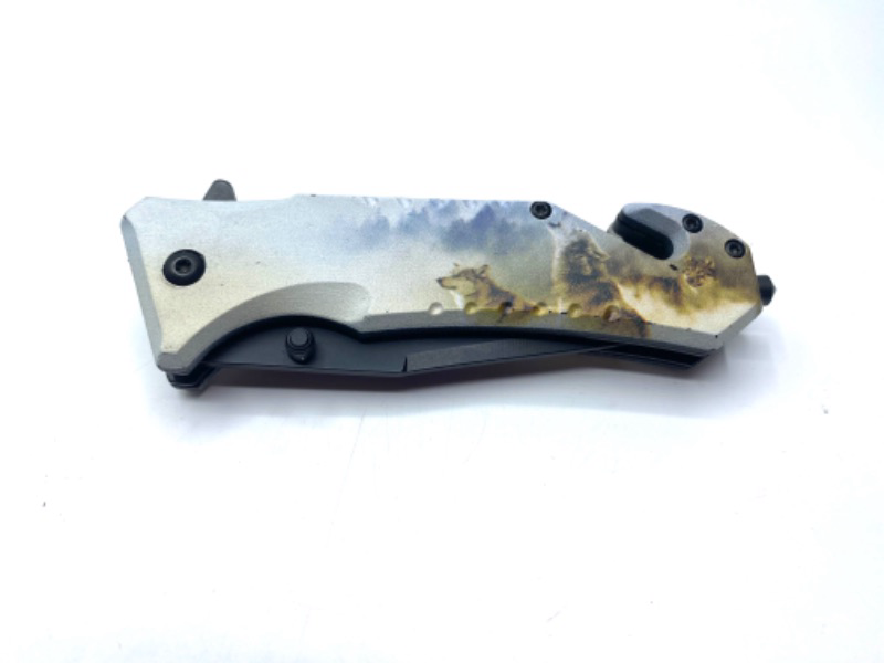 Photo 1 of Wolf Pocket Knife with Seatbelt Cutter Window Breaker and Clip New