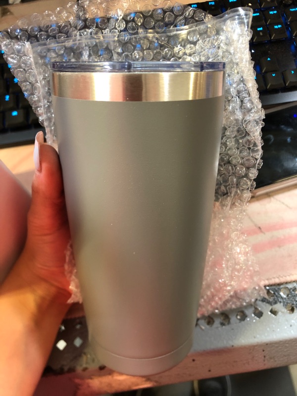 Photo 1 of  grey thermal tumbler