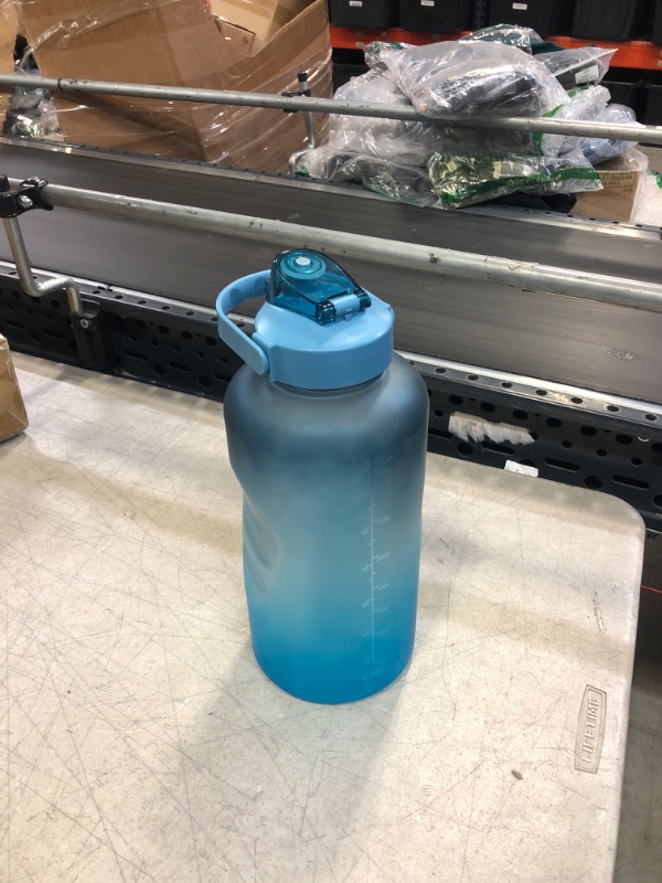 Photo 1 of 128 OZ BLUE WATER BOTTLE 