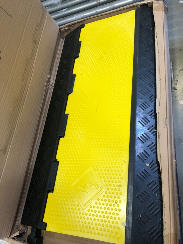 Photo 1 of CXRCY Cable Ramp 1 Pack of 5 Channel PVC Rubber Cable Protector,18000lbs Capacity Heavy Duty Speed Bumps Hose Cord Protector Ramps for Wire/Hose/Pipe Hider Driveway &Indoor 1 Pack 5 Channel