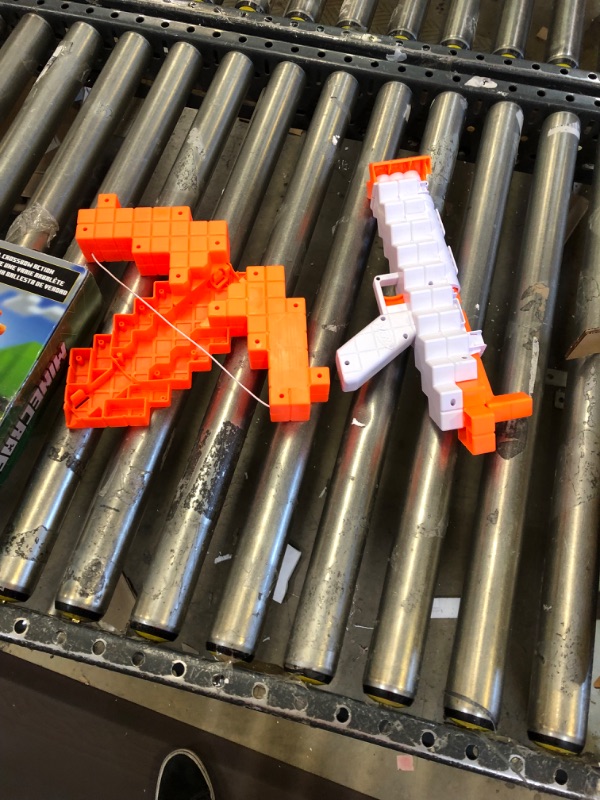 Photo 2 of NERF Minecraft Pillager's Crossbow, Dart-Blasting Crossbow, Includes 3 Elite Darts, Real Crossbow Action, Pull-Back Priming Handle
